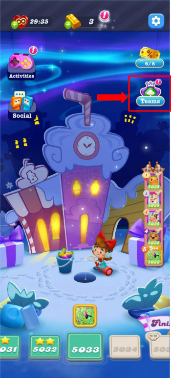 Écran principal du jeu, avec Kimmy pêchant sur la glace à Candyville. À droite, l'icône Équipes est mise en évidence car c'est là que les joueurs doivent cliquer