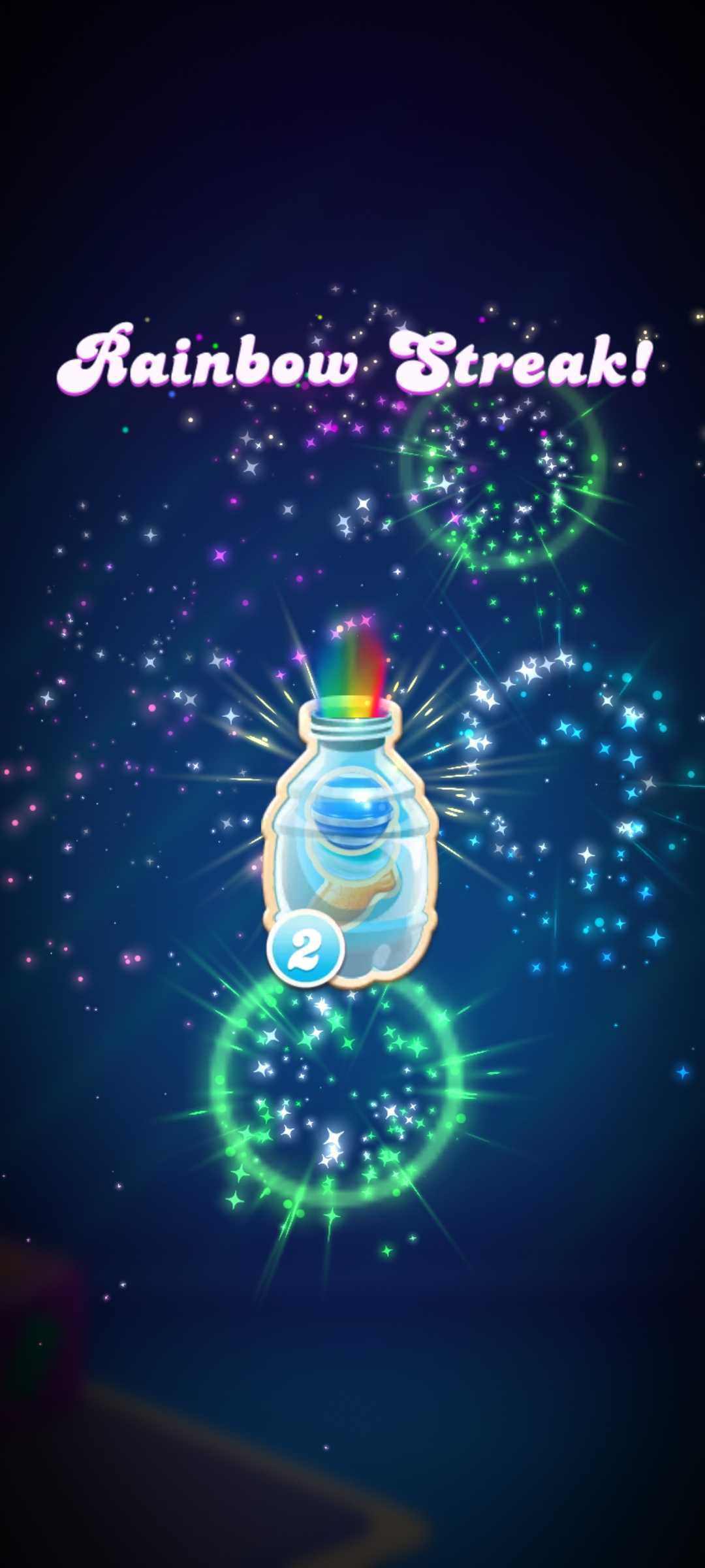 A Soda bottle in the sky surrounded by fireworks. The text reads Rainbow Streak!